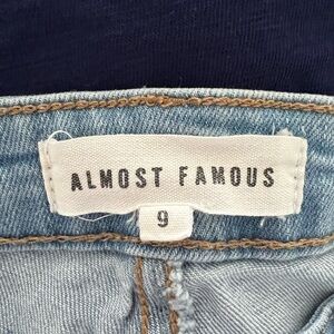 Almost Famous Light Wash Denim Jeans with Navy and Purple Top Accents
